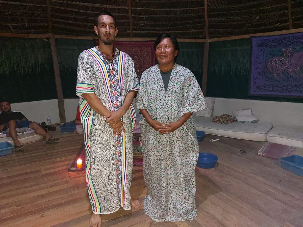 Mark with the Shipibo Maestro in the maloca during ceremony