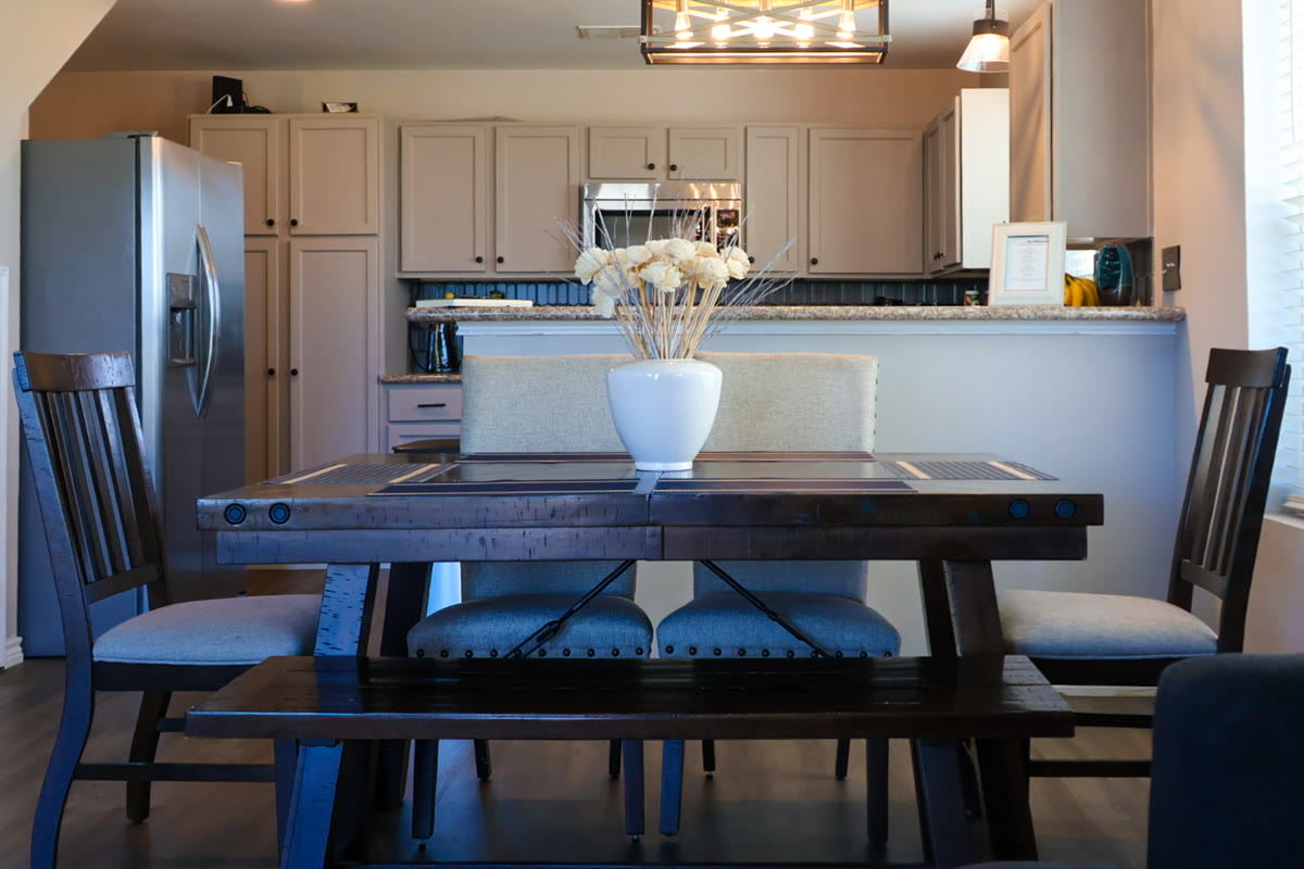 The shared kitchen and dining table inside the ranch house
